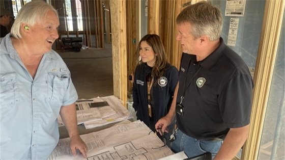 Building inspectors review site plans.